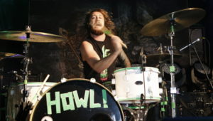 The Howling's Jackyboy giving the drums some stick!